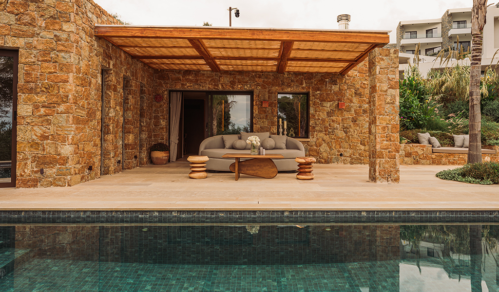 Seafront Villa in Mavro Lithari with direct beach access, luxury spa, private pools, Mediterranean gardens, and breathtaking sea views.